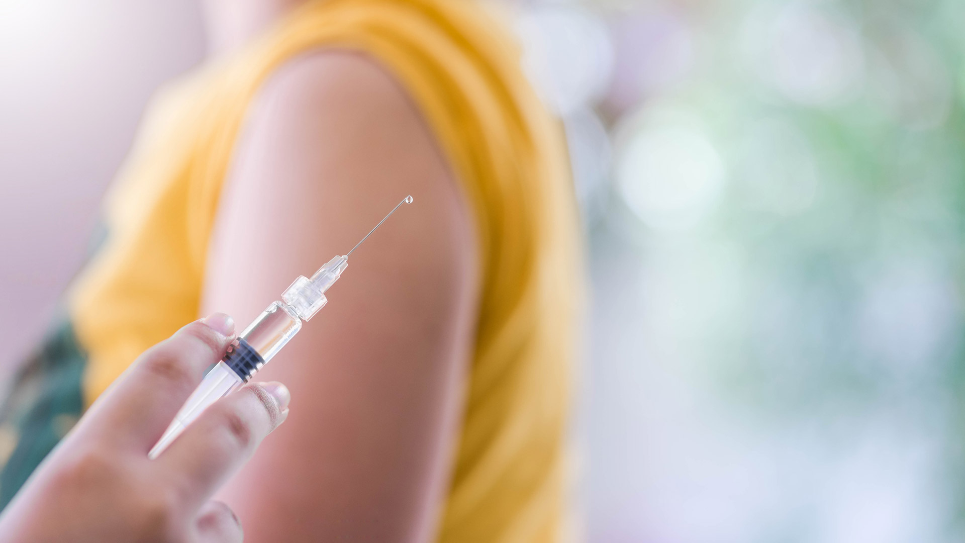 Close up of a vaccine shot being given.