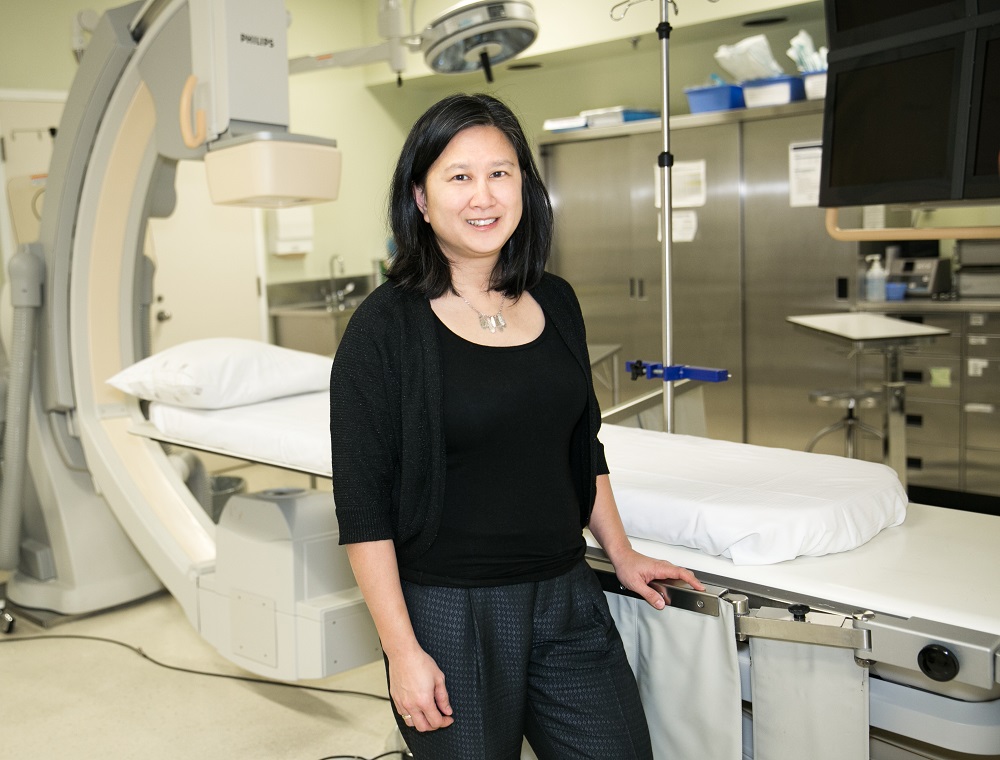 Dr. Susanna Mak in a hospital treatment room.