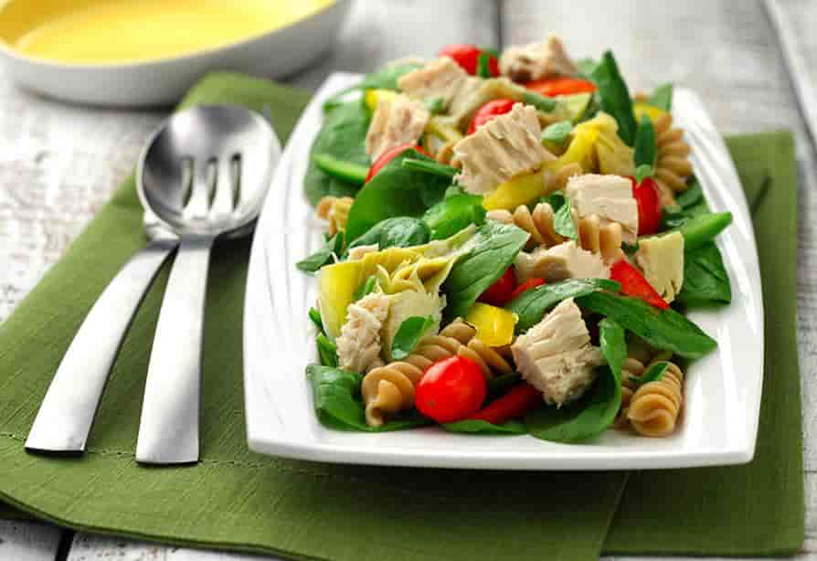 Spinach, cherry tomatoes, artichokes, rotini pasta, tuna