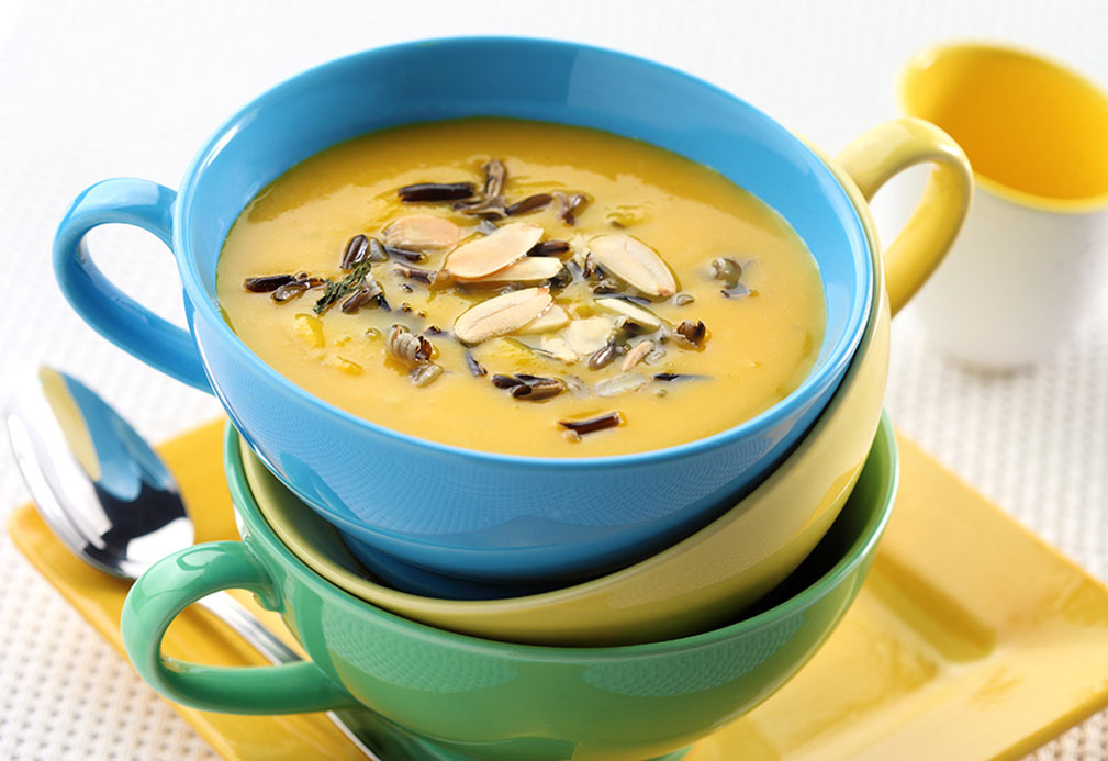 Butternut squash and apple soup with wild rice and sliced almonds