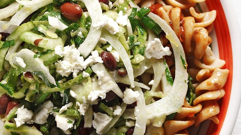 Fusilli pasta with shredded zucchini, fennel, feta and black beans