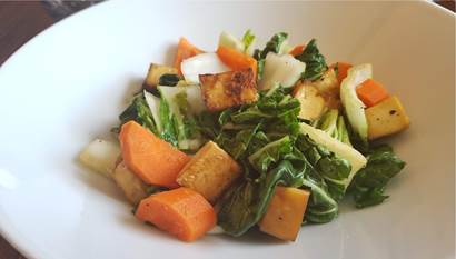 Grilled tofu, carrots and bok choy in white bowl