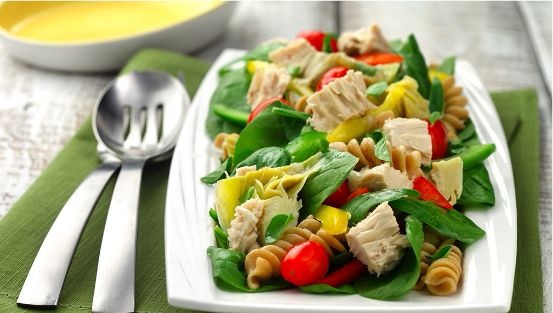 Spinach, cherry tomatoes, artichokes, rotini pasta, tuna