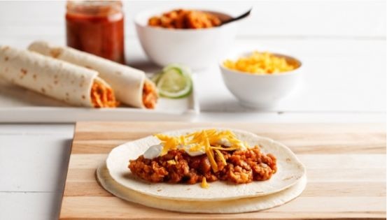 Tortilla with lentils, cheddar cheese and sour cream