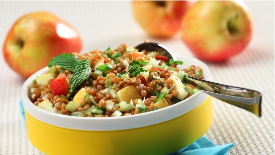 Wheatberry and chopped apple in a bowl