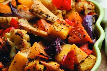 Roasted red pepper, squash, sweet potato, carrot and cauliflower in a casserole dish