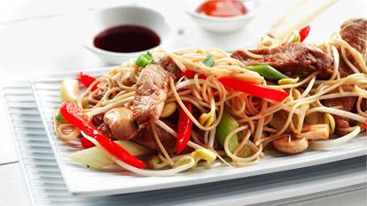 Sliced pork, noodles, red peppers, scallions and mushrooms