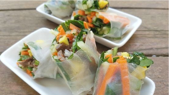 Sliced beef, vegetables rolled in rice paper wrappers