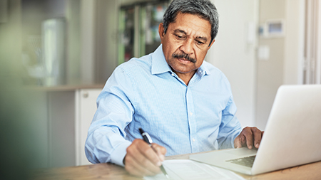 Man budgeting his finances