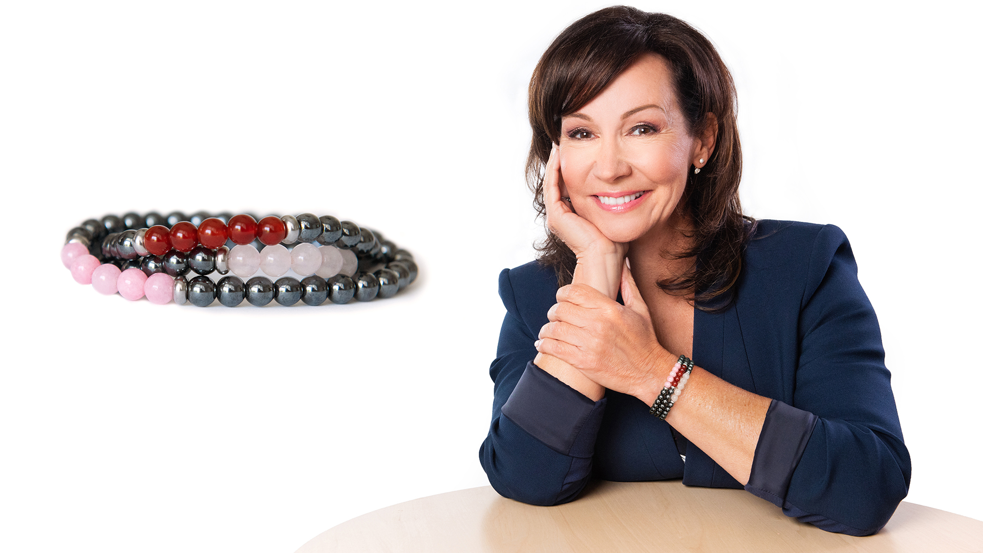 Josee Boudreault headshot with a jewel of life bracelets. Josee Boudreault headshot with a jewel of life bracelets.