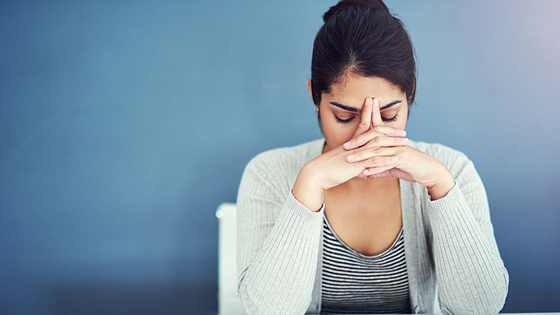Close up of woman with headache
