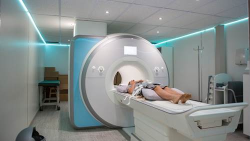 Person entering MRI machine. 