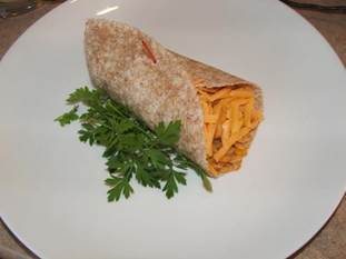 Chicken burrito on a white plate
