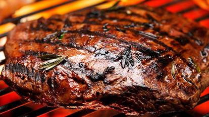 Grilled steak on barbeque