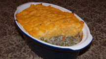 Turkey and barley shepherd’s pie in a white dish