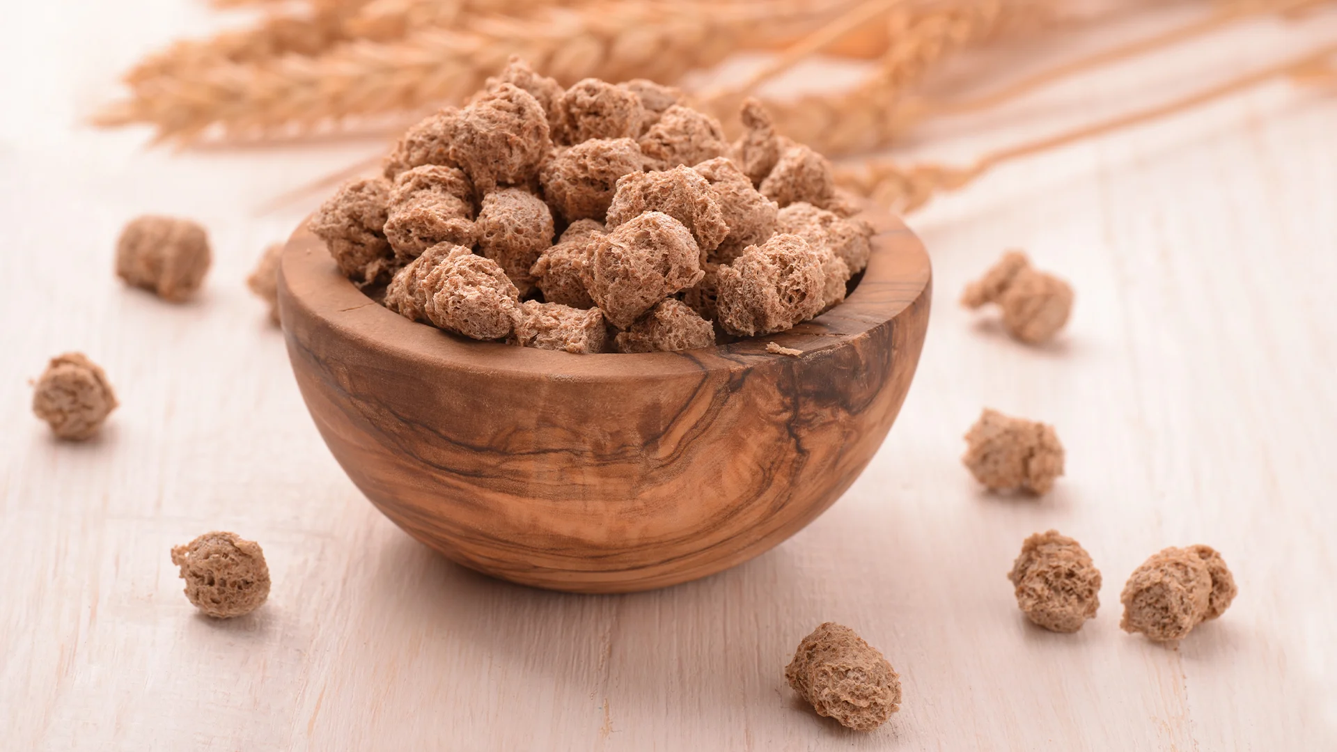 Bowl full of wheat bran and wheat ears