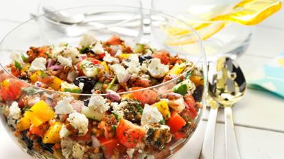 Greek lentil salad in a glass bowl