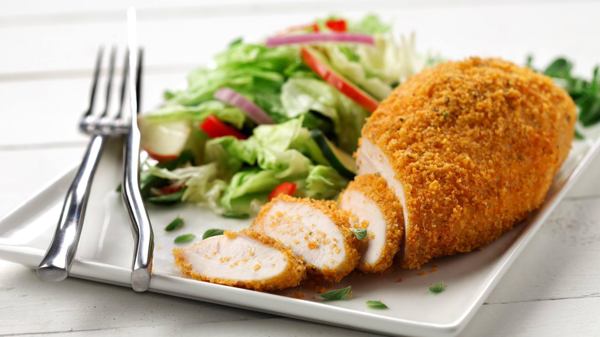 Baked chicken with a side salad