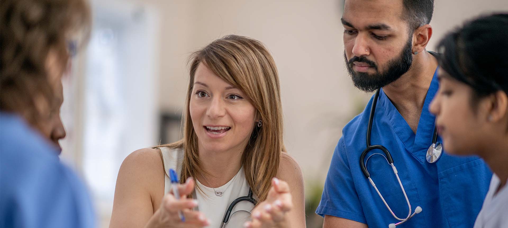 Healthcare professionals having a discussion.