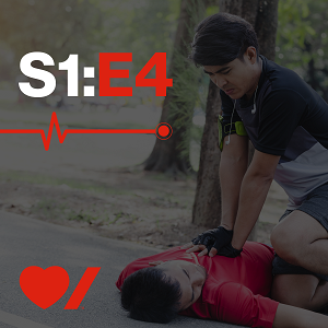 A man does CPR on another man lying on the ground.