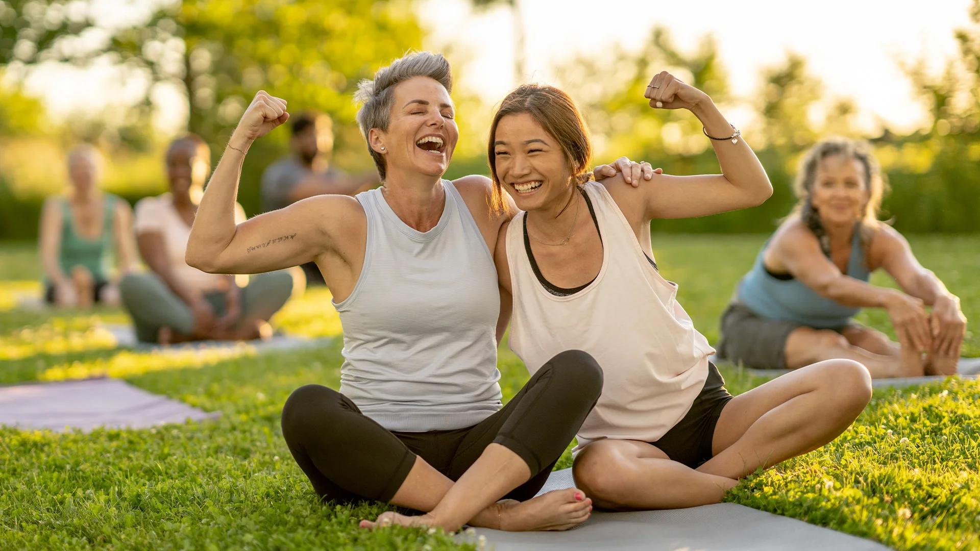 Two women doing yoga