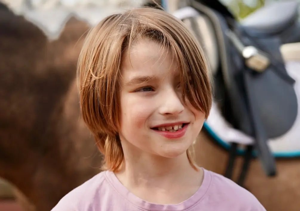 Logan after an awesome horseback ride.