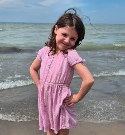 Natalie soaking up the sun at the beach. 