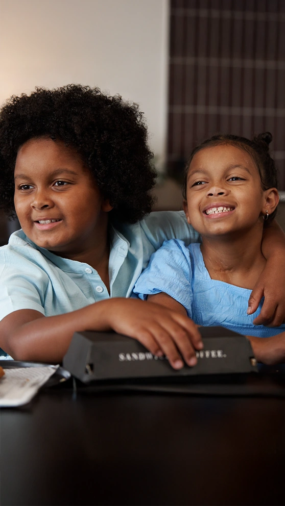 Nora with her twin brother, Koa.