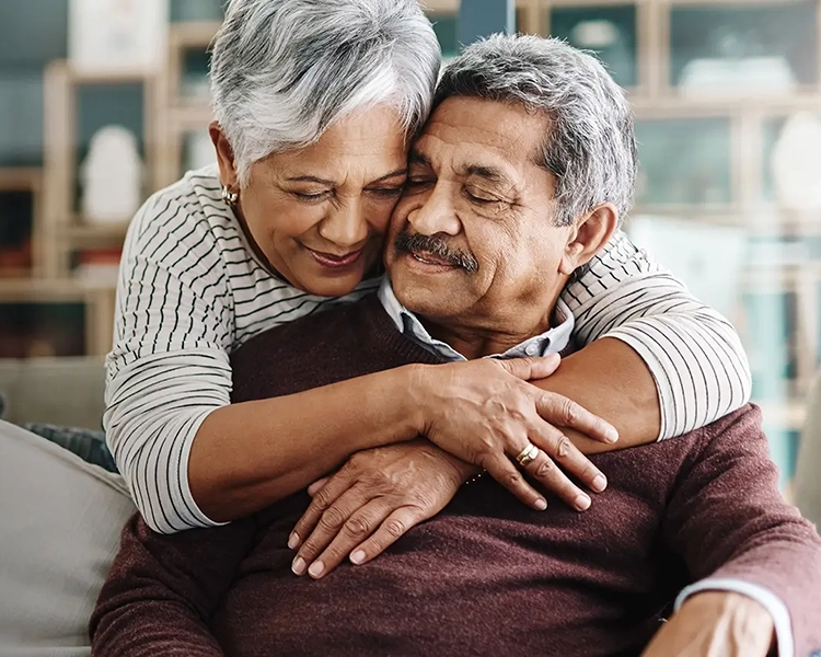 A couple embracing.