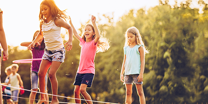 Kids playing outdoors on a sunny day