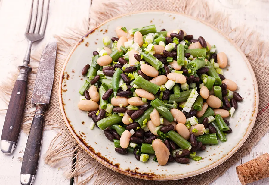 A plate of mixed bean salad.