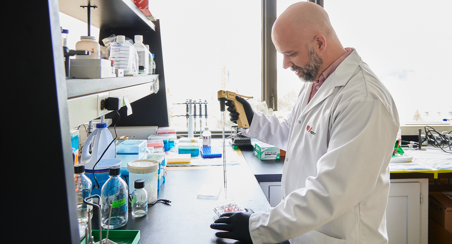 Dr. Bryan Heit performing tests in his lab