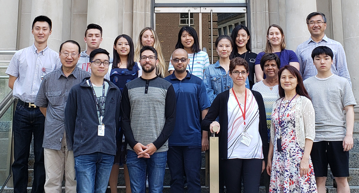 Doctor Ren-Ke Li with his lab team
