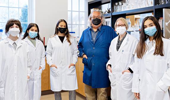 Dr. Glen Pyle with his research team