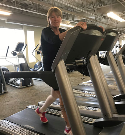 Heather Evans running on a treadmill