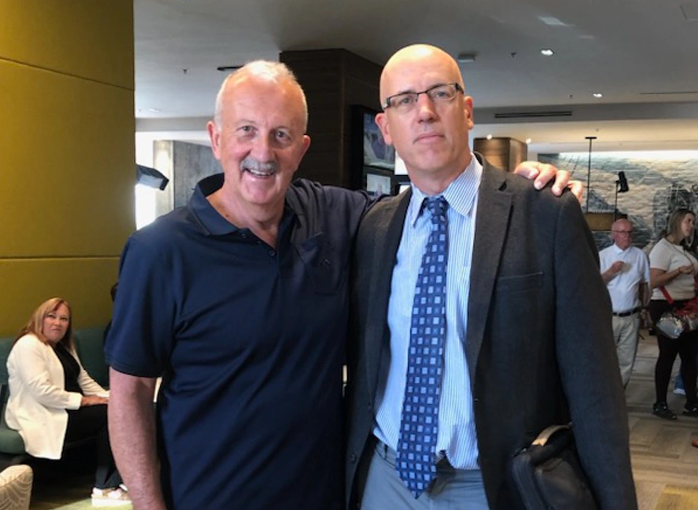 John with Dr. Michael Hill.