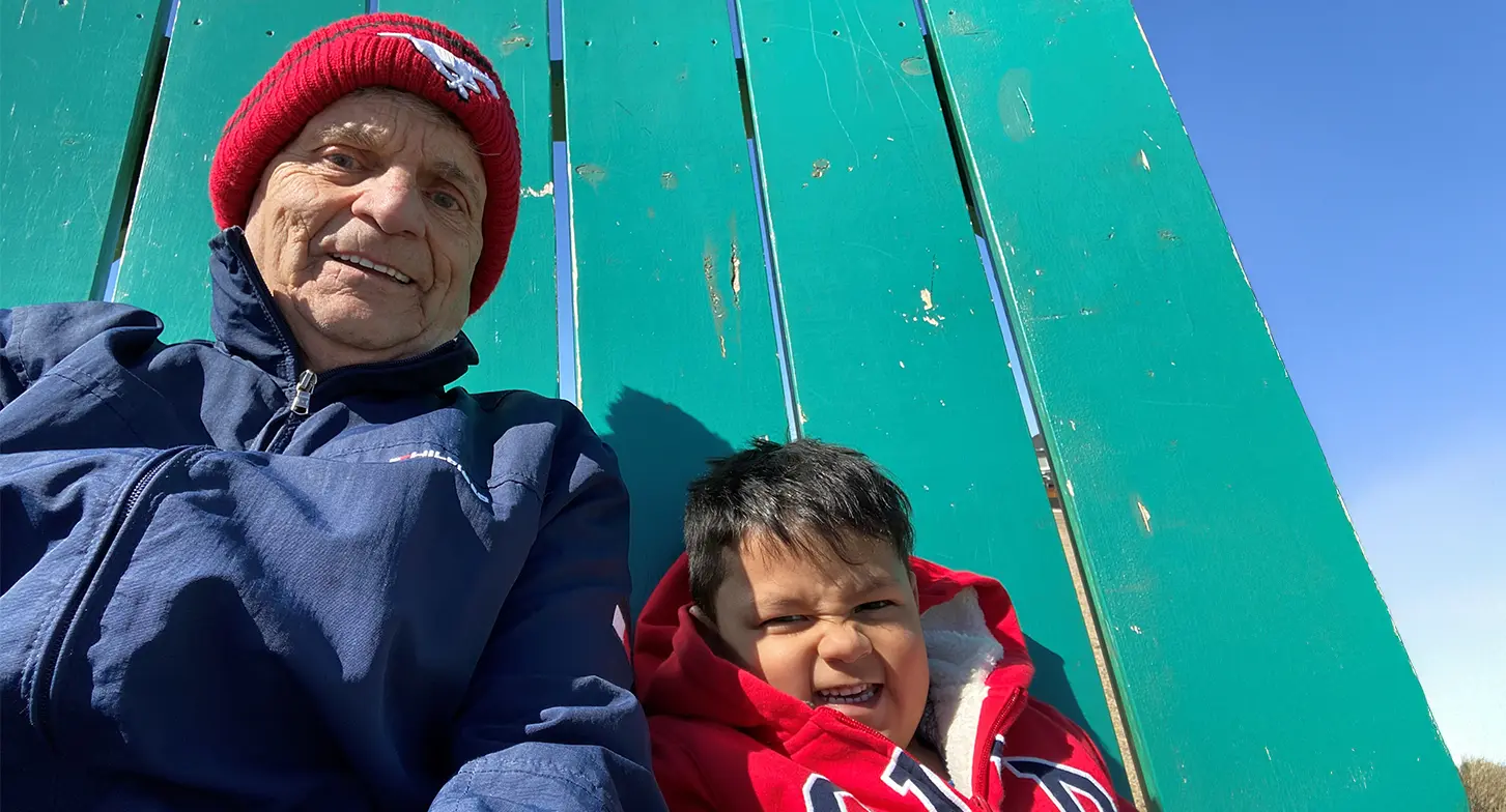 John Wheatcroft with his grandson, Pernell.