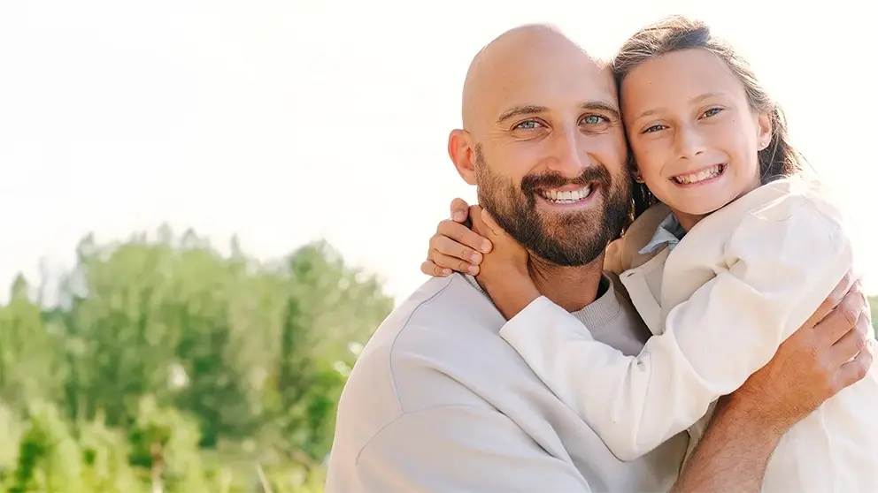 NHL captain Nick Foligno holds his 11-year-old daughter, Milana, who was diagnosed with congenital heart disease at birth.