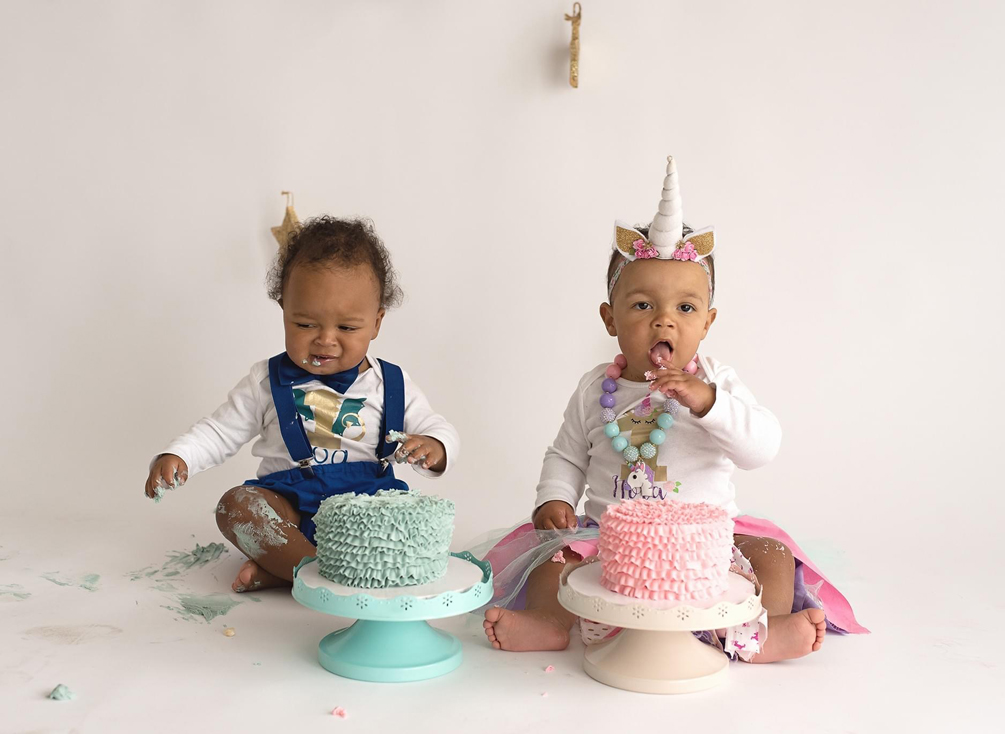 Twins Koa and Nora eat birthday cake.