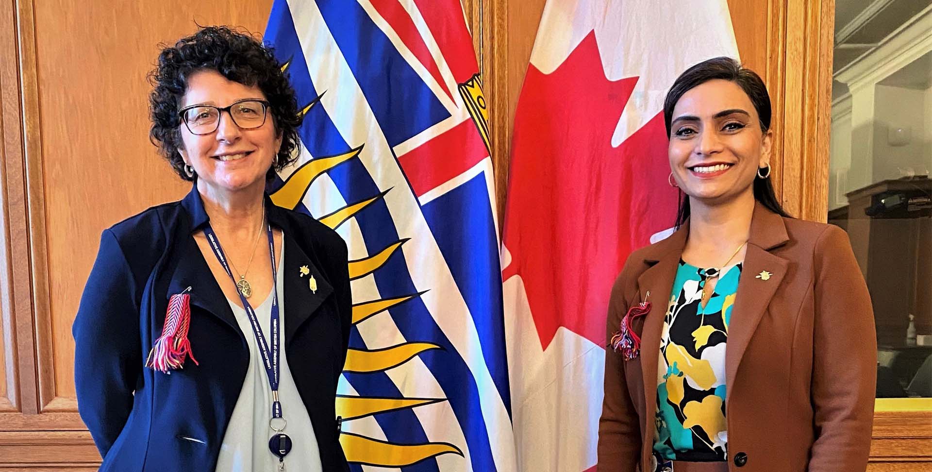 Pam Alexis (left) and Harwinder Sandhu (right) pose for a photo.