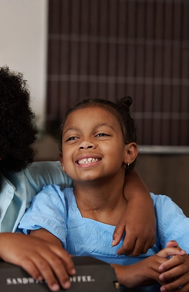 Portrait of young Nora with her twin brother Koa