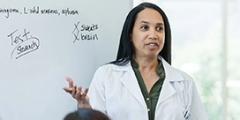 A woman doctor presenting.