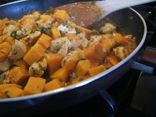 sweet potatoes sauteing in a skillet